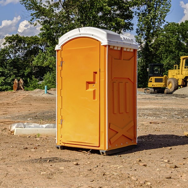 what is the cost difference between standard and deluxe portable restroom rentals in Docena